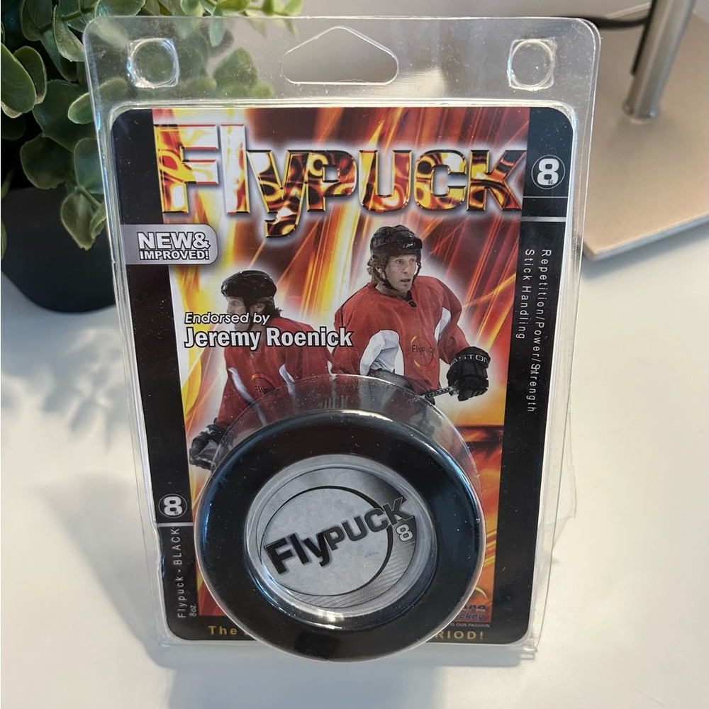 Fly puck, 8 oz weighted puck for working on your stick handling
